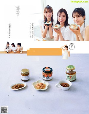 A group of women sitting at a table eating food.