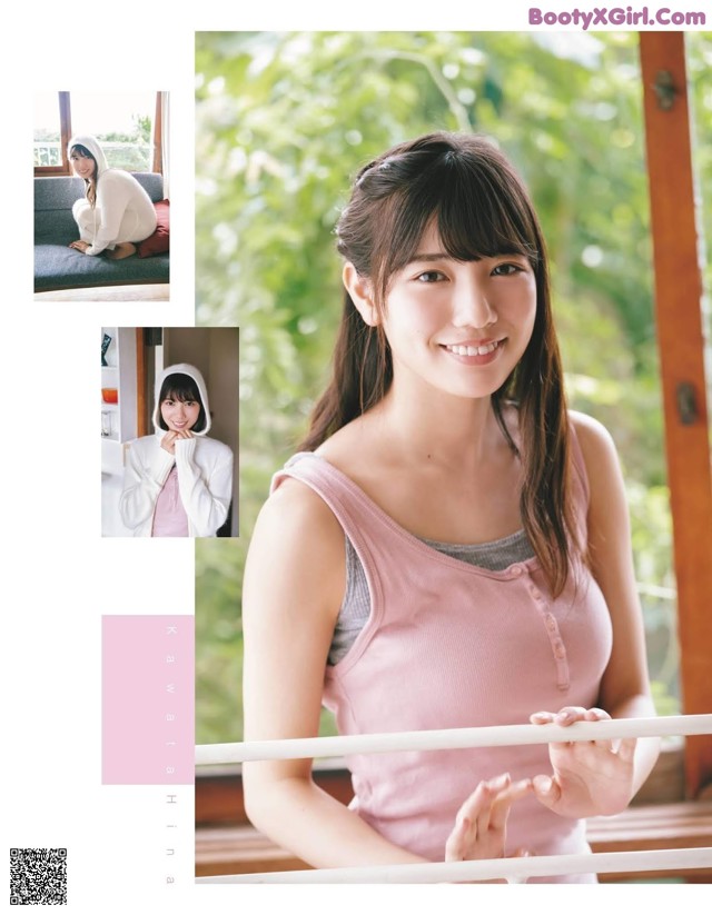 A woman in a pink tank top is posing for a picture.